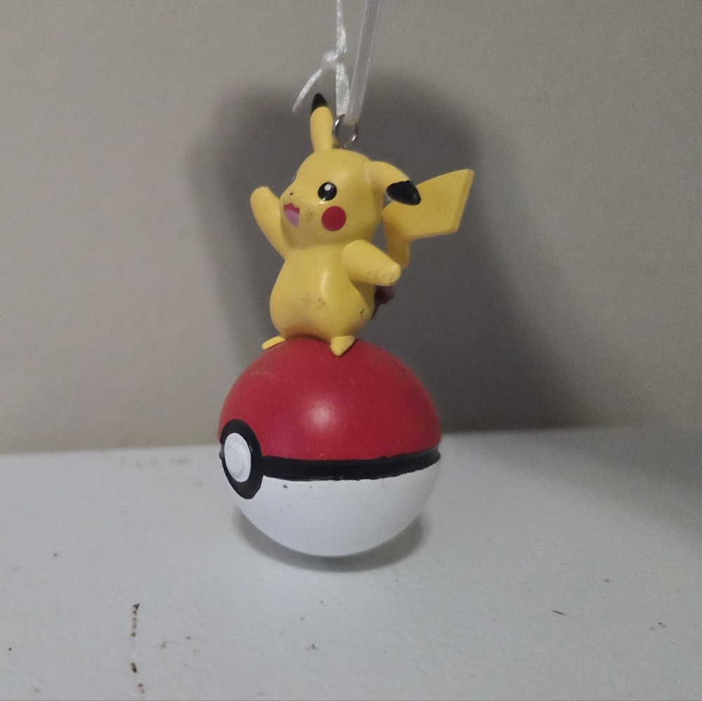 Hallmark Pokémon Pikachu on Poké Ball Christmas Ornament.